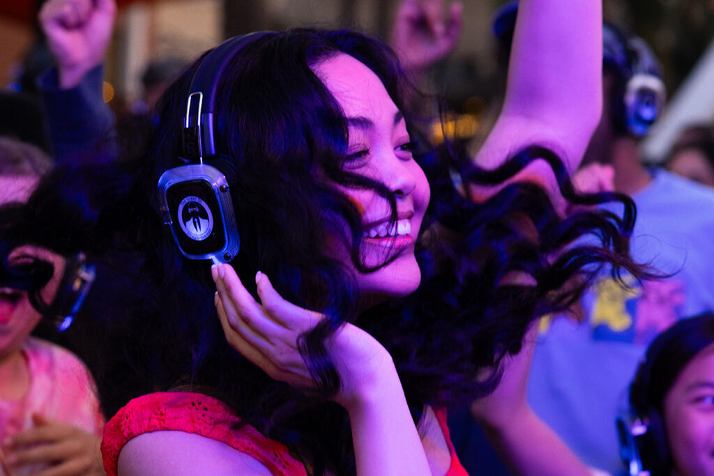 Young woman at Silent Disco at Irvine Spectrum Center